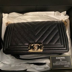 SOLD! Chanel old medium boy caviar chevron 19s